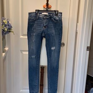 Distressed skinny jeans